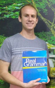 Carl Eldridge with his book, Rea Grammar