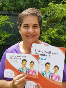 Elene Claire with the new resource, Living Well with Hepatitis B