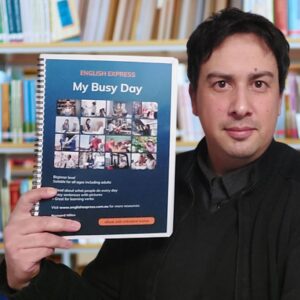 Bernard Miles with his new resource for beginner ESL students